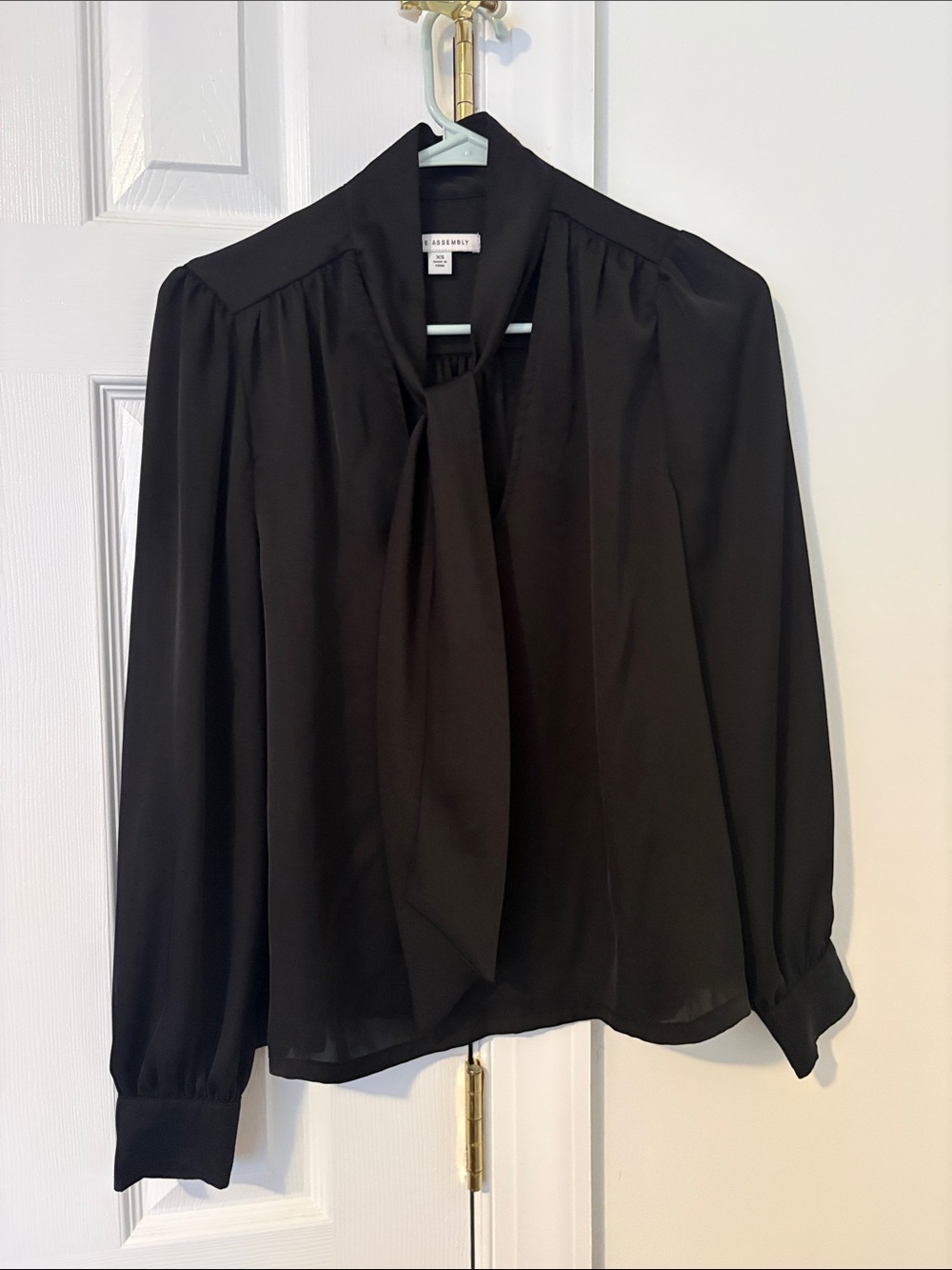Long-Sleeve Black Tie-Neck Blouse